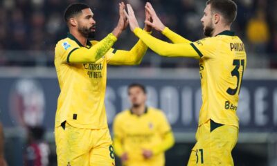 AC Milan's Ruben Loftus-Cheek, left, celebrates with Strahinja Pavlovic after scoring a goal during the Serie A soccer match between Bologna and Milan in Bologna, Italy, Tuesday Feb. 3, 2026. (Massimo Paolone/LaPresse via AP)