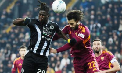 Udinese's Oumar Solet, left, fights for the ball with Roma's Mario Hermoso during the Serie A soccer match between Udinese and Roma at the Bluenergy Stadium in Udine, Italy, Monday, Feb. 2, 2026. (Andrea Bressanutti/LaPresse via AP)