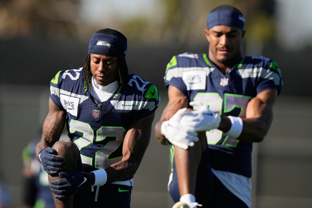 Seattle Seahawks wide receivers Rashid Shaheed (22) and Montorie Foster Jr. (87) stretch during an NFL Super Bowl football practice on Wednesday, Feb. 4, 2026, in San Jose, Calif., ahead of Super Bowl 60 between the New England Patriots and the Seattle Seahawks. (AP Photo/Brynn Anderson)