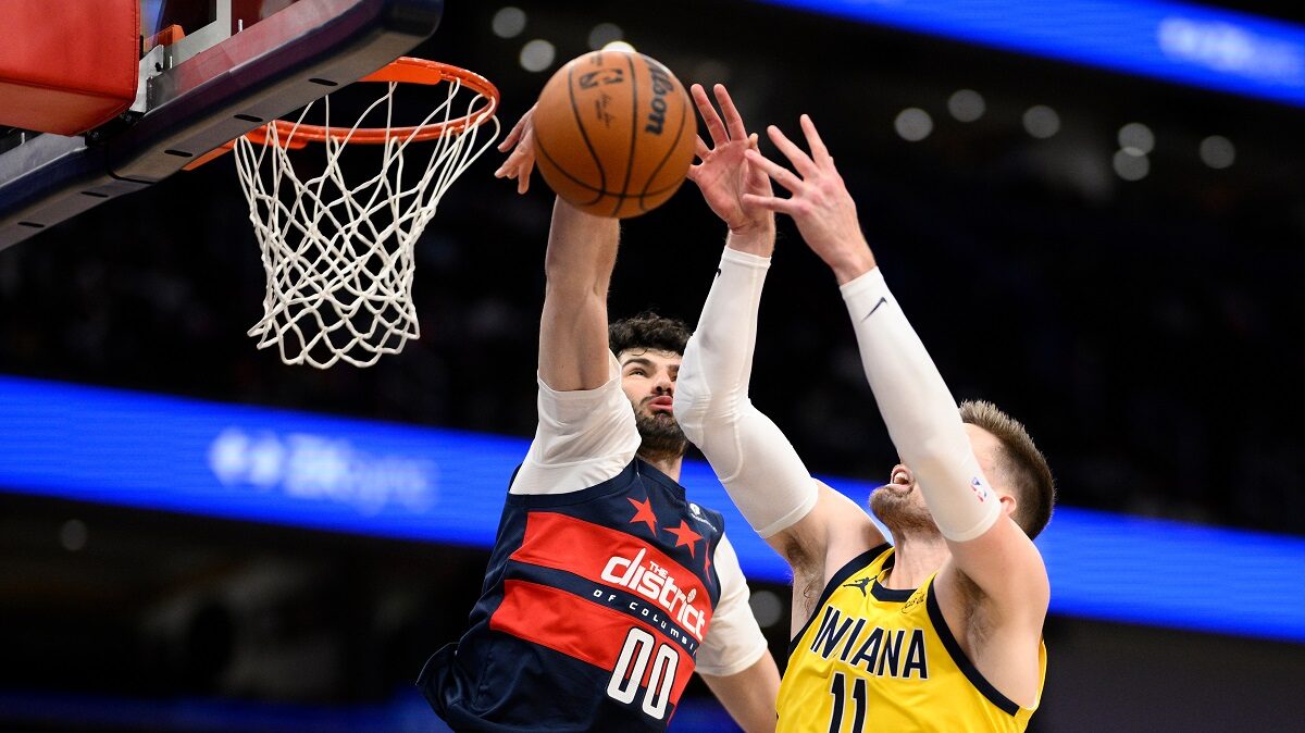 Washington Wizards forward Tristan Vukcevic (00) blocks Indiana Pacers center Micah Potter (11) during the first half of an NBA basketball game, Friday, Feb. 20, 2026, in Washington. (AP Photo/Nick Wass)