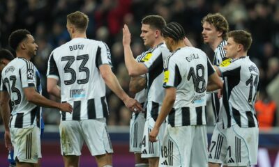 Newcastle platers celebrate after a goal during the Champions League second leg playoff match between Newcastle and Qarabag in Newcastle, England, Tuesday, Feb. 24, 2026. (AP Photo/Jon Super)
