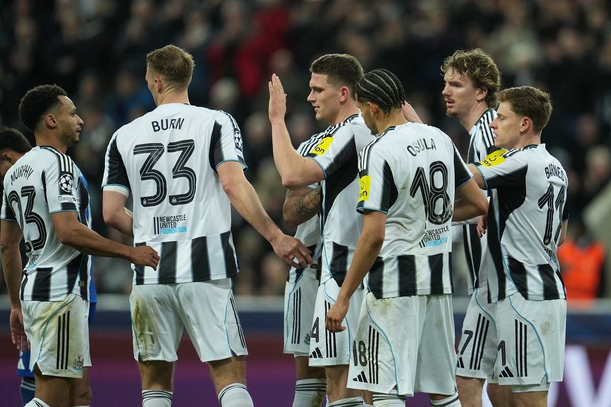 Newcastle platers celebrate after a goal during the Champions League second leg playoff match between Newcastle and Qarabag in Newcastle, England, Tuesday, Feb. 24, 2026. (AP Photo/Jon Super)