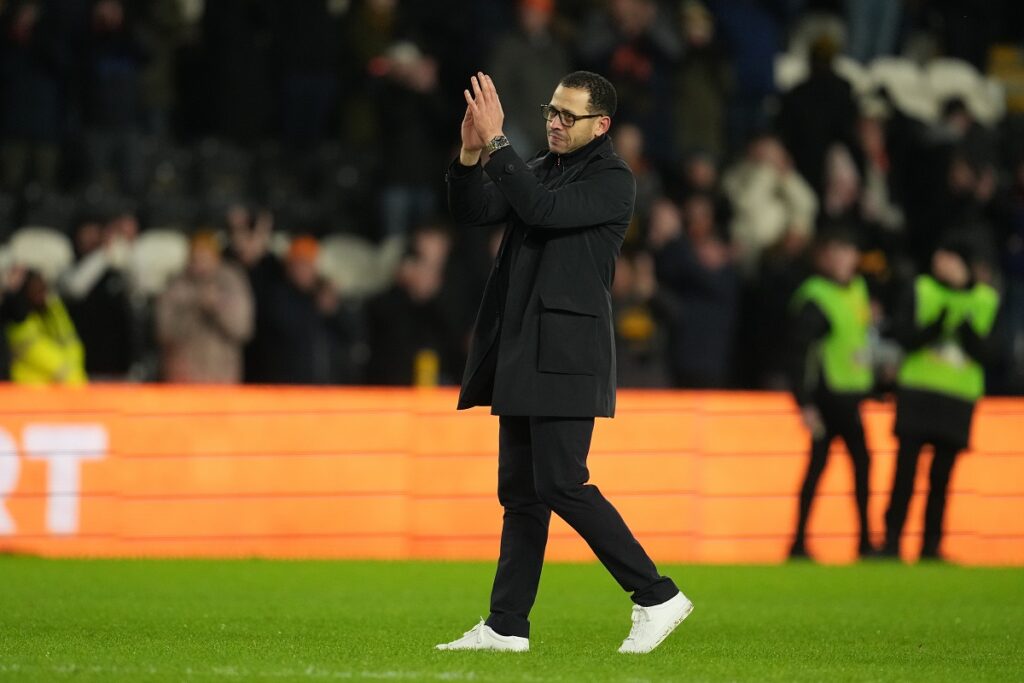 Chelsea's head coach Liam Rosenior walks off the pitch after the English FA Cup fourth round soccer match between Hull City and Chelsea in Hull, England, Friday, Feb. 13, 2026. (AP Photo/Jon Super)