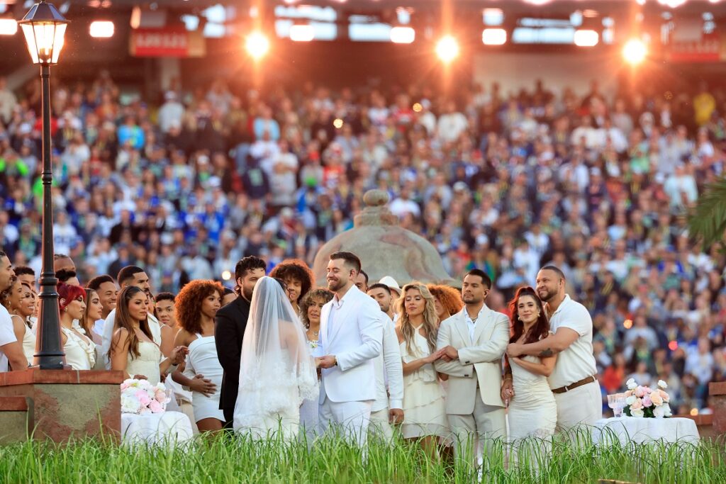 A couple gets married in a real ceremony during the halftime show of Super Bowl 60 between the Seattle Seahawks and New England Patriots in Santa Clara, Calif., Sunday, Feb. 8, 2026. (Carlos Avila Gonzalez/San Francisco Chronicle via AP)