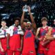 Members of Team Vince hold up their trophies after they defeated Team Melo in a final in NBA basketball's Rising Stars event Friday, Feb. 13, 2026, in Inglewood, Calif. (AP Photo/Mark J. Terrill)