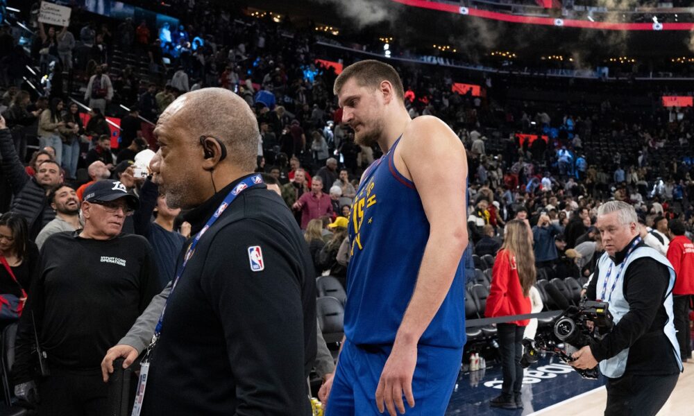 Denver Nuggets center Nikola Jokic (15) walks back to the locker room after an NBA basketball game against the Los Angeles Clippers Thursday, Feb. 19, 2026, in Inglewood, Calif. (AP Photo/Kyusung Gong)