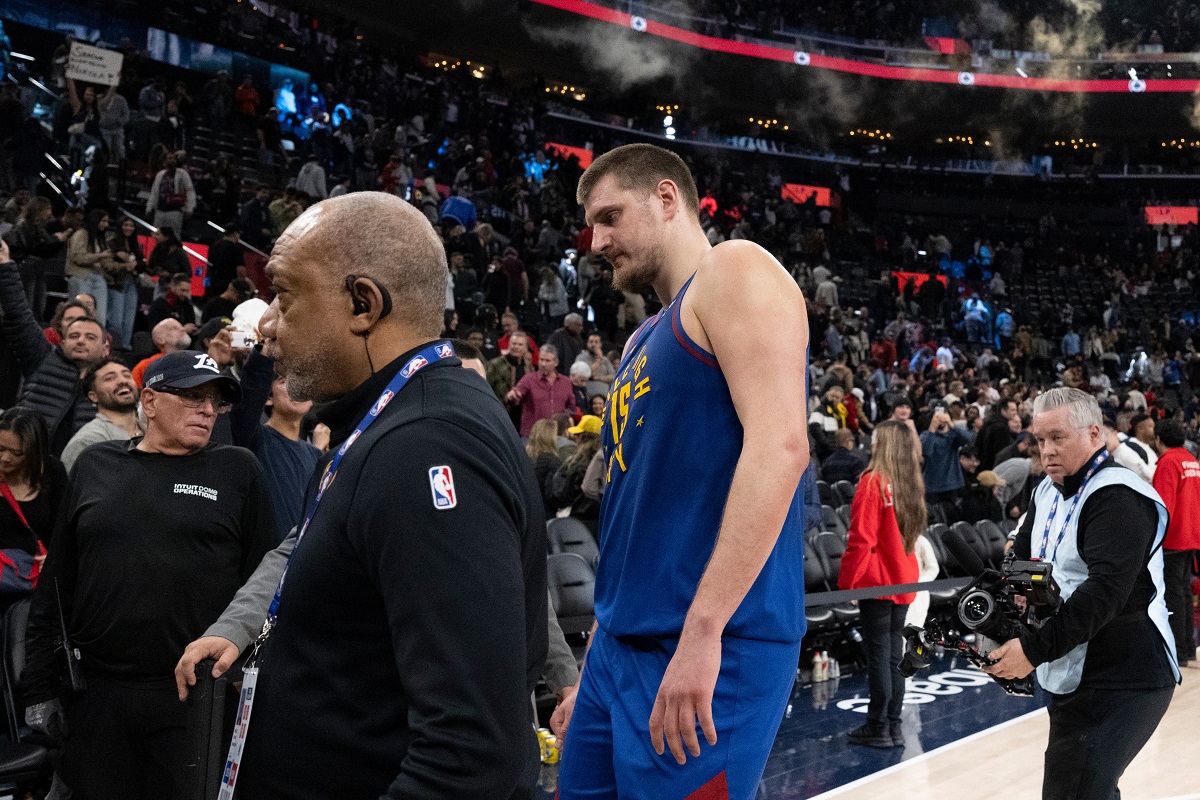 Denver Nuggets center Nikola Jokic (15) walks back to the locker room after an NBA basketball game against the Los Angeles Clippers Thursday, Feb. 19, 2026, in Inglewood, Calif. (AP Photo/Kyusung Gong)