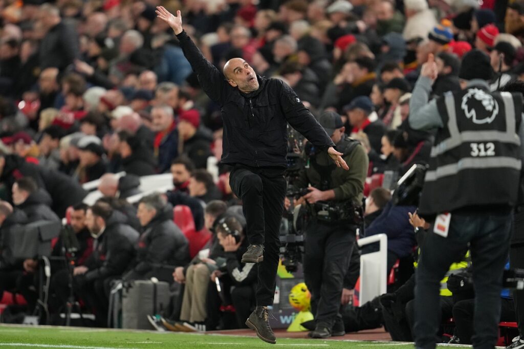 Manchester City's head coach Pep Guardiola reacts during the English Premier League soccer match between Liverpool and Manchester City in Liverpool, England, Sunday, Feb. 8, 2026. (AP Photo/Jon Super)