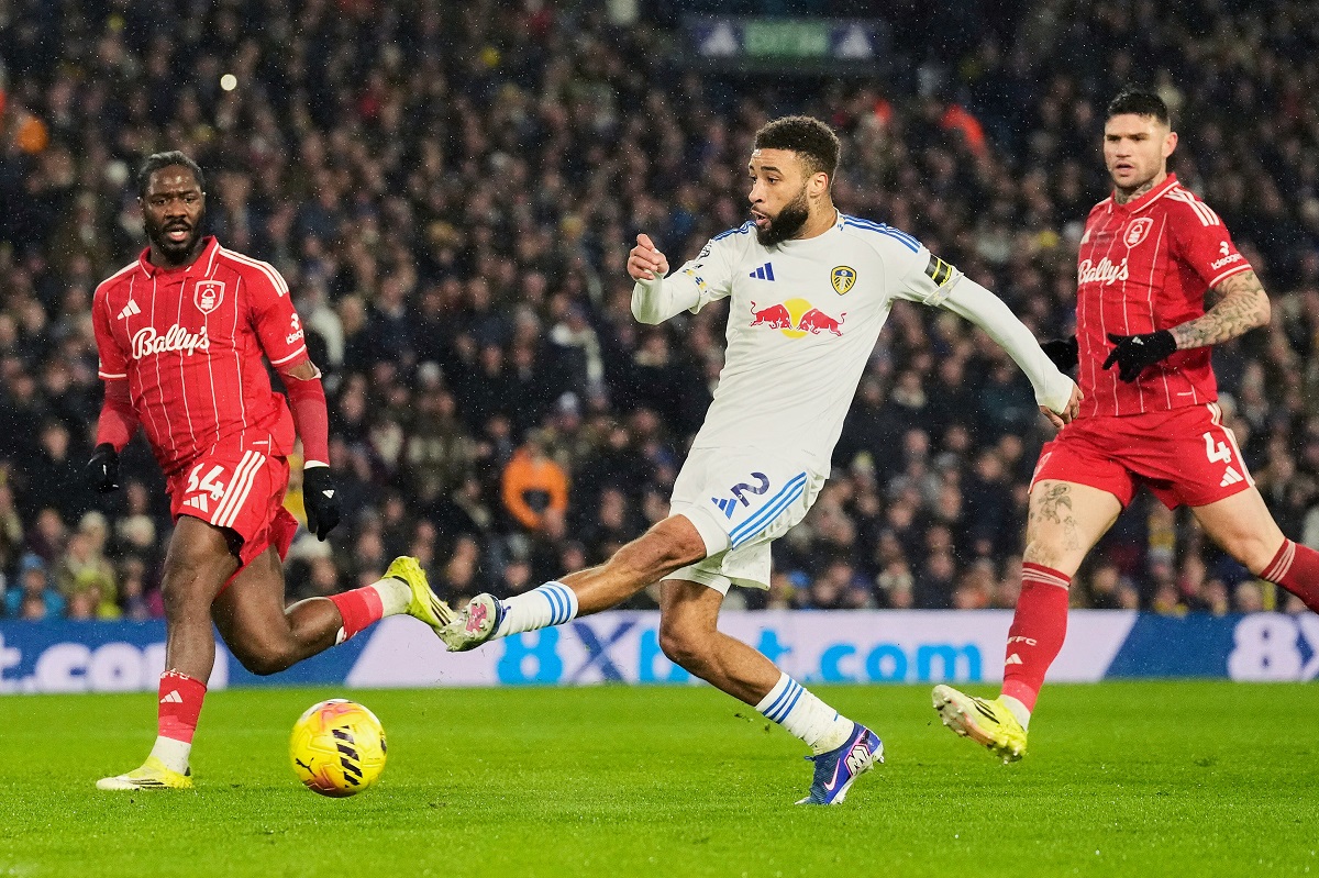 Leeds United's Jayden Bogle scores their first goal during the English Premier League soccer match between Leeds United and Nottingham Forest in Leeds, England, Friday Feb. 6, 2026. (Danny Lawson/PA via AP)