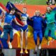 Angelina Topic, of Serbia, Yaroslava Mahuchikh, of Ukraine, Yuliia Levchenko, of Ukraine, and Nicola Olyslagers, of Australia, from left, jump for a winners photo after the women's high jump final at the World Athletics Indoor Championships in Torun, Poland, Friday, March 20, 2026. (AP Photo/Matthias Schrader)