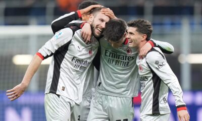 AC Milan's Strahinja Pavlovic, left, celebrates after scoring their side's first goal of the game during the Serie A soccer match between Milan and Torino in Milan, Italy, Saturday, March 21 , 2026. (Spada/LaPresse via AP)