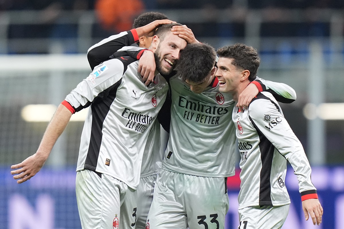 AC Milan's Strahinja Pavlovic, left, celebrates after scoring their side's first goal of the game during the Serie A soccer match between Milan and Torino in Milan, Italy, Saturday, March 21 , 2026. (Spada/LaPresse via AP)