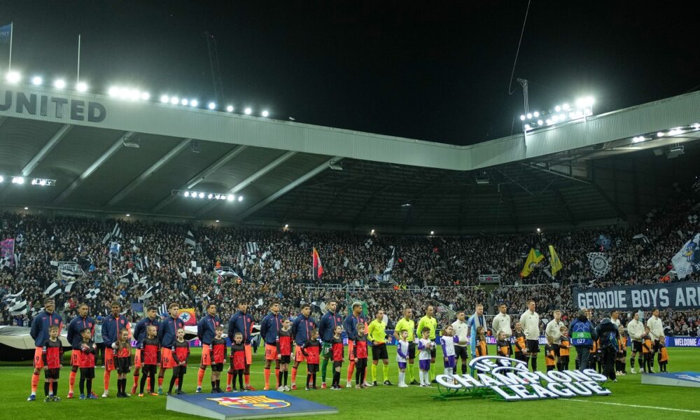 Barcelona, left, and Newcastle line up before the Champions League round of 16 first leg soccer match between Newcastle United and Barcelona in Newcastle , England, Tuesday, March 10, 2026. (AP Photo/Jon Super)
