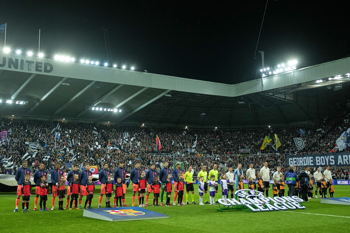 Barcelona, left, and Newcastle line up before the Champions League round of 16 first leg soccer match between Newcastle United and Barcelona in Newcastle , England, Tuesday, March 10, 2026. (AP Photo/Jon Super)