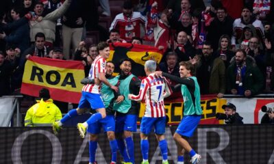 Atletico Madrid's Julian Alvarez, left, celebrates with teammates after scoring his side's fifth goal during the first leg of the Champions League round of 16 soccer match between Atletico Madrid and Tottenham in Madrid, Spain, Tuesday, March 10, 2026. (AP Photo/Jose Breton)