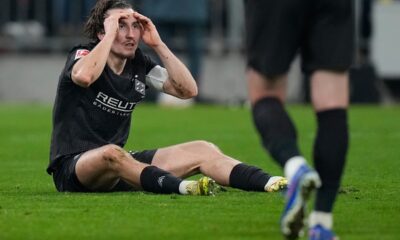 Moenchengladbach's Rocco Reitz reacts after receiving a red card during the Bundesliga soccer match between FC Bayern Munich and Borussia Moenchengladbach in Munich, Germany, March 6, 2026. (AP Photo/Matthias Schrader)