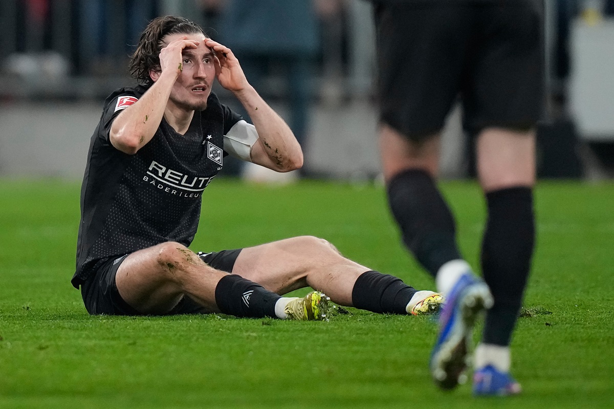 Moenchengladbach's Rocco Reitz reacts after receiving a red card during the Bundesliga soccer match between FC Bayern Munich and Borussia Moenchengladbach in Munich, Germany, March 6, 2026. (AP Photo/Matthias Schrader)