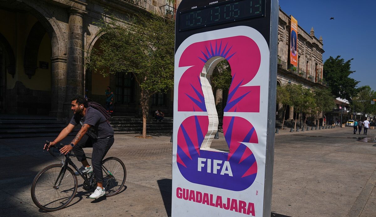 A cyclist rides past an installation promoting the FIFA World Cup 2026 in Guadalajara, Mexico, Wednesday, Feb. 25, 2026. (AP Photo/Marco Ugarte)