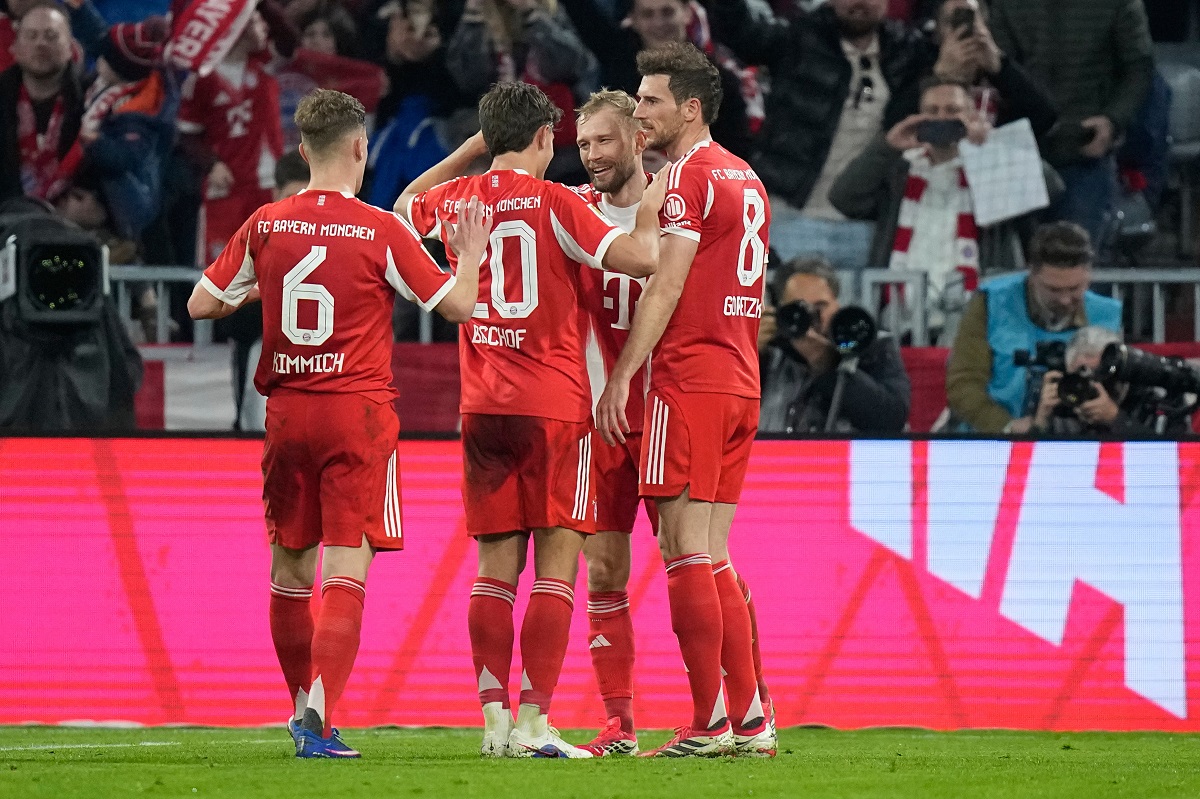 Bayern's Konrad Laimer, center, celebrates after scoring his side's second goal during the Bundesliga soccer match between FC Bayern Munich and Borussia Moenchengladbach in Munich, Germany, March 6, 2026. (AP Photo/Matthias Schrader)