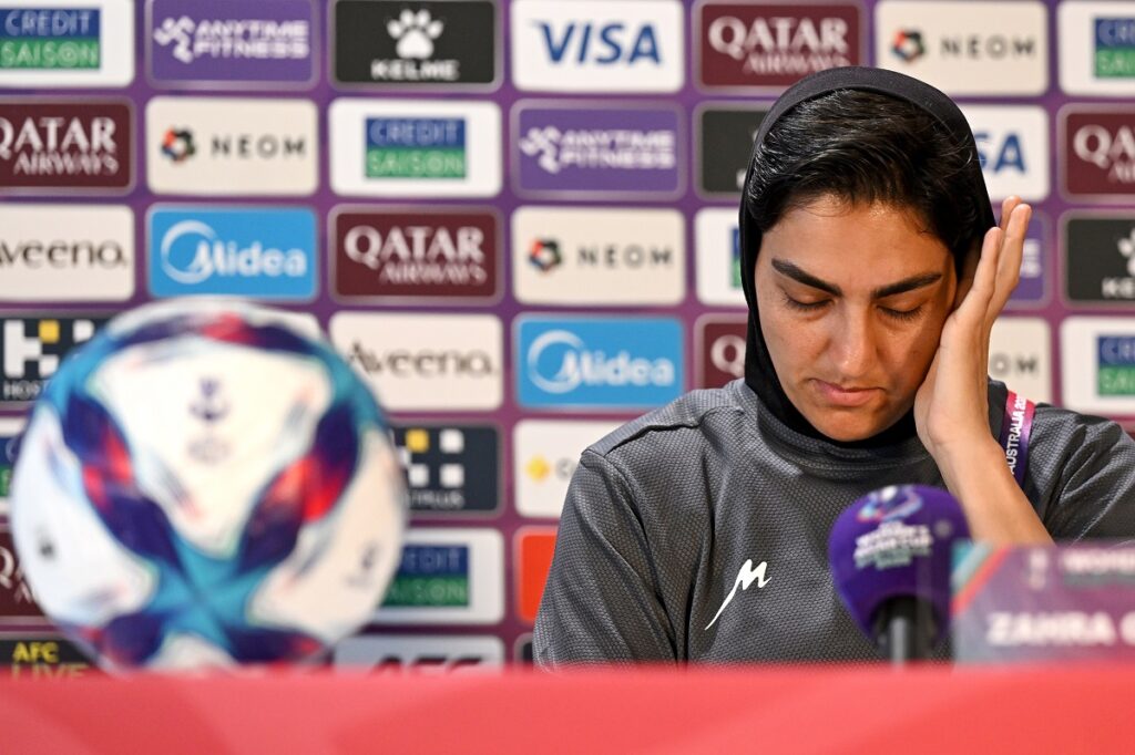 Iranian women's national soccer team captain Zahra Ghanbari reacts during a press conference ahead of their game against South Korea on Monday at Robina Stadium on the Gold Coast, Australia, Sunday, March 1, 2026. (Dave Hunt/AAP Image via AP)
