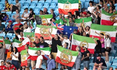 Iranian supporters react during the Women's Asia Cup soccer match between Iran and South Korea on the Gold Coast, Australia, Monday, March 2, 2026. (Dave Hunt/AAPImage via AP)