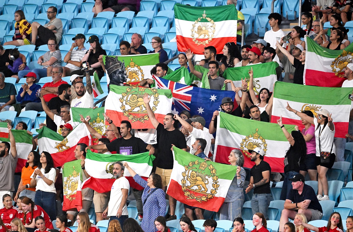 Iranian supporters react during the Women's Asia Cup soccer match between Iran and South Korea on the Gold Coast, Australia, Monday, March 2, 2026. (Dave Hunt/AAPImage via AP)