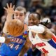 Oklahoma City Thunder guard Nikola Topic (44) and Detroit Pistons guard Daniss Jenkins scramble for a loose ball during the second half of an NBA basketball game, Wednesday, Feb. 25, 2026, in Detroit. (AP Photo/Duane Burleson)