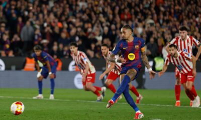 Barcelona's Raphinha scores from the penalty spot his side's second goal during the Copa del Rey semifinal second leg soccer match between Barcelona and Atletico Madrid in Barcelona, Spain, Tuesday, March 3, 2026. (AP Photo/Joan Monfort)