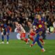 Barcelona's Raphinha scores from the penalty spot his side's second goal during the Copa del Rey semifinal second leg soccer match between Barcelona and Atletico Madrid in Barcelona, Spain, Tuesday, March 3, 2026. (AP Photo/Joan Monfort)