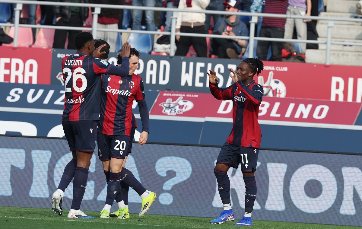 Bologna's Jonathan Rowe, right, celebrates after scoring during the Italian Serie A soccer match between Bologna and Verona in Bologna, Italy, Sunday, March 8, 2026. (Gianni Santandrea/LaPresse via AP)