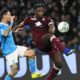 Torino's Duvan Zapata, right, and Napoli's Matteo Politano in action during the Serie A soccer match between Napoli and Torino in Naples, Italy, Friday March 6, 2026. (Alessandro Garofalo/LaPresse via AP)