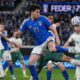 Italy's Alessandro Bastoni, front, and Northern Ireland's Shea Charles vie for the ball during the World Cup qualifying play-off soccer match between Italy and Northern Ireland, in Bergamo, Italy, Thursday, March 26, 2026. (AP Photo/Antonio Calanni)