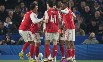 Arsenal players celebrate after a goal during the Premier League soccer match between Brighton and Arsenal in Brighton, England, Wednesday, March 4, 2026. (AP Photo/Alastair Grant)