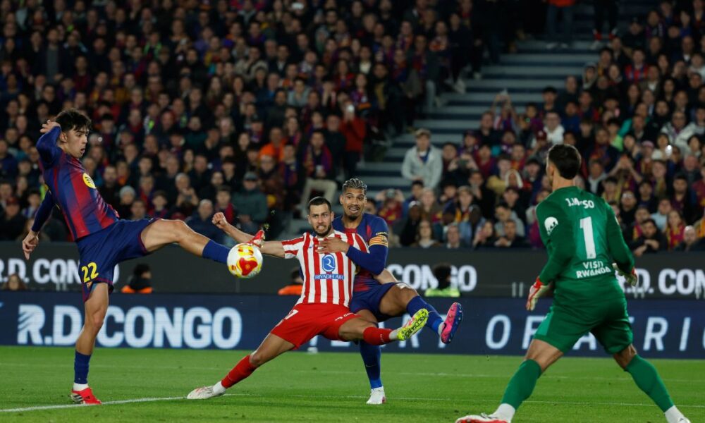 Barcelona's Marc Bernal scores his side's third goal during the Copa del Rey semifinal second leg soccer match between Barcelona and Atletico Madrid in Barcelona, Spain, Tuesday, March 3, 2026. (AP Photo/Joan Monfort)