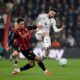 Bournemouth's James Hill, left, and Manchester United's Bruno Fernandes battle for the ball during an Premier League soccer match, Friday, March 20, 2026, in Bournemouth, England. (Andrew Matthews/PA via AP)