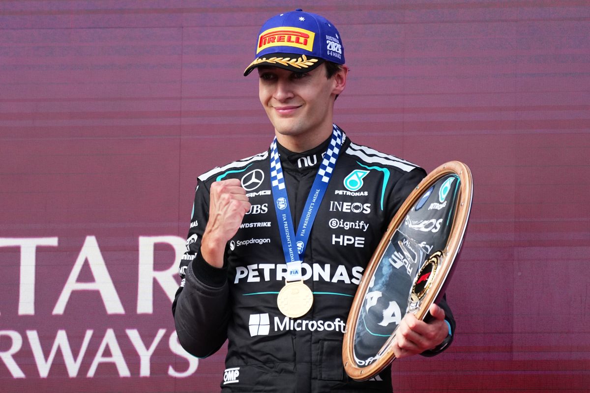 Mercedes driver George Russell of Britain celebrates after winning the Australian Formula One Grand Prix at Albert Park, in Melbourne, Australia, Sunday, March 8, 2026. (AP Photo/Scott Barbour)