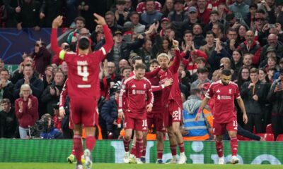 Liverpool's Hugo Ekitike celebrates with teammates after scoring his side's second goal during the second leg of the Champions League round of 16 soccer match between Liverpool and Galatasaray, in Liverpool, England, Wednesday, March 18, 2026. (AP Photo/Jon Super)