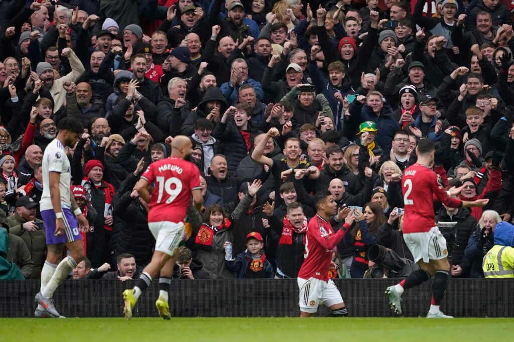 Manchester United's Casemiro, center, celebrates after a goal during the Premiier League soccer match between Manchester United and Aston Villa in Manchester, England, Sunday, March 15, 2026. (AP Photo/Dave Thompson)