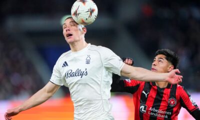 Nottingham Forest's Nikola Milenkovic, left, and Midtjylland's Dario Osorio in action during the Europa League soccer match between FC Midtjylland and Nottingham Forest in Herning, Denmark, Thursday March 19, 2026. (Bo Amstrup/Ritzau Scanpix via AP)