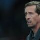 Former Chelsea player Peter Crouch arrives for the English Premier League soccer match between Aston Villa and Chelsea in Birmingham, England, Wednesday, March 4, 2026. (AP Photo/Dave Shopland)