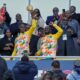 enegal players celebrate with the Africa Cup of Nations trophy ahead of the international friendly soccer match between Senegal and Peru in Saint-Denis, outside of Paris, Saturday, March 28, 2026. (AP Photo/Aurelien Morissard)