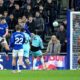 Everton's James Tarkowski, top left, scores their side's first goal of the game during their English Premier League soccer match against Burnley in Liverpool, England, Tuesday, March 3, 2026. (Peter Byrne/PA via AP)