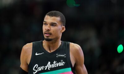 San Antonio Spurs' Victor Wembanyama looks on during the first half of an NBA basketball game against the Milwaukee Bucks, Saturday, March 28, 2026, in Milwaukee. (AP Photo/Aaron Gash)