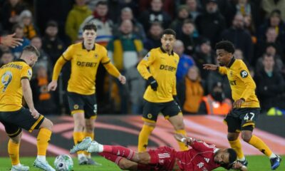 Liverpool's Cody Gakpo goes to ground after a challenge during the English Premier League soccer match between Wolverhampton Wanderers and Liverpool in Wolverhampton, England, Tuesday, March 3, 2026. (AP Photo/Dave Shopland)