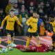 Liverpool's Cody Gakpo goes to ground after a challenge during the English Premier League soccer match between Wolverhampton Wanderers and Liverpool in Wolverhampton, England, Tuesday, March 3, 2026. (AP Photo/Dave Shopland)