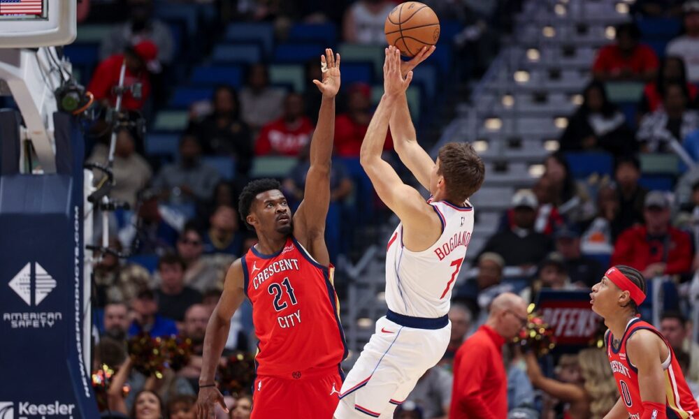 Los Angeles Clippers guard Bogdan Bogdanovic (7) shoots a jumper over New Orleans Pelicans center Yves Missi (21) in the second half of an NBA basketball game in New Orleans, Thursday, March 19, 2026. (AP Photo/Peter Forest)