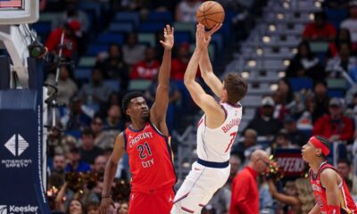 Los Angeles Clippers guard Bogdan Bogdanovic (7) shoots a jumper over New Orleans Pelicans center Yves Missi (21) in the second half of an NBA basketball game in New Orleans, Thursday, March 19, 2026. (AP Photo/Peter Forest)