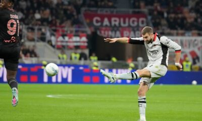 AC Milan's Strahinja Pavlovic scores his side's opening goal during the Serie A soccer match between AC Milan and Torino, in Milan, Italy, Saturday, March 21, 2026. (AP Photo/Luca Bruno)
