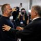 Joan Laporta reacts as he greets Barcelona's head coach Hansi Flick, left, after the voting for the election to be president of FC Barcelona in Barcelona, Spain, Sunday, March 15, 2026. (AP Photo/Joan Monfort)