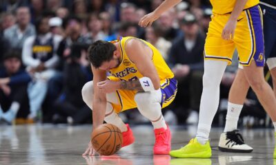 Los Angeles Lakers guard Luka Dončić reacts after getting hit in the face by the ball in the first half of an NBA basketball game against the Denver Nuggets Thursday, March 5, 2026, in Denver. (AP Photo/David Zalubowski)